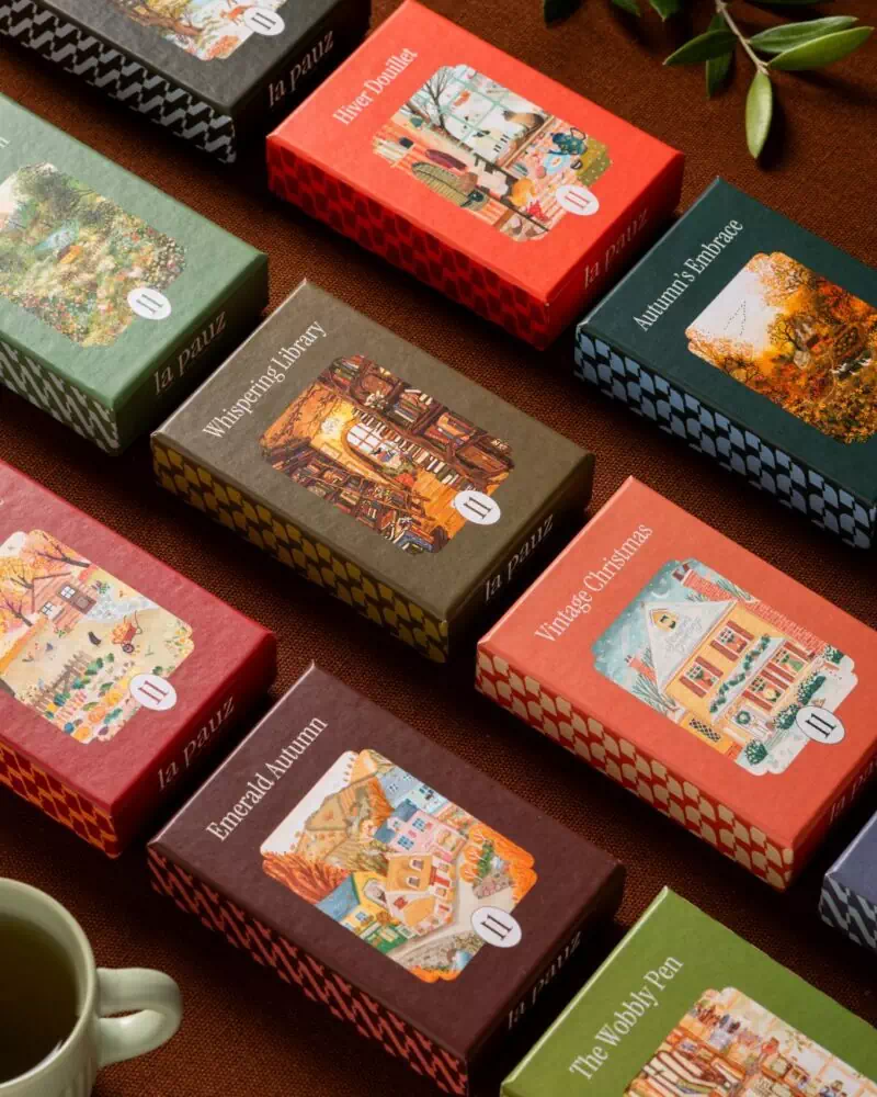 pile de boites de mini puzzles La Pauz, packagings et boites de qualité.